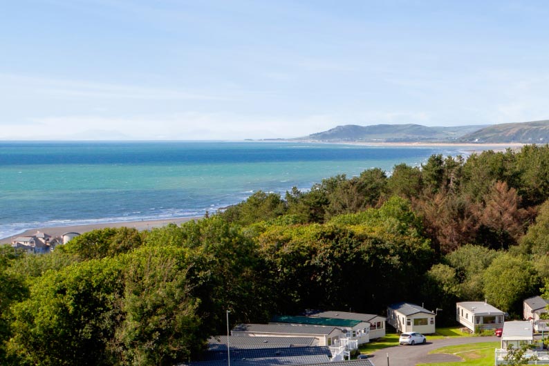 Caravans at Brynowen Holiday Park overlooking the Welsh coast