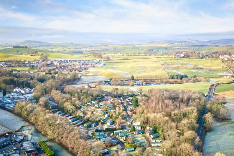 An aerial view over Gatebeck Holiday Park in the Lake District