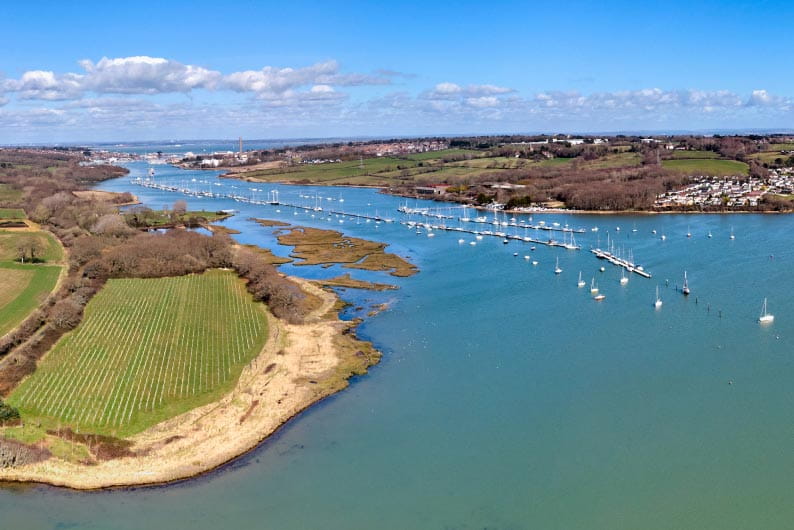 Boats moored in Newtown Bay creek on the Isle of Wight