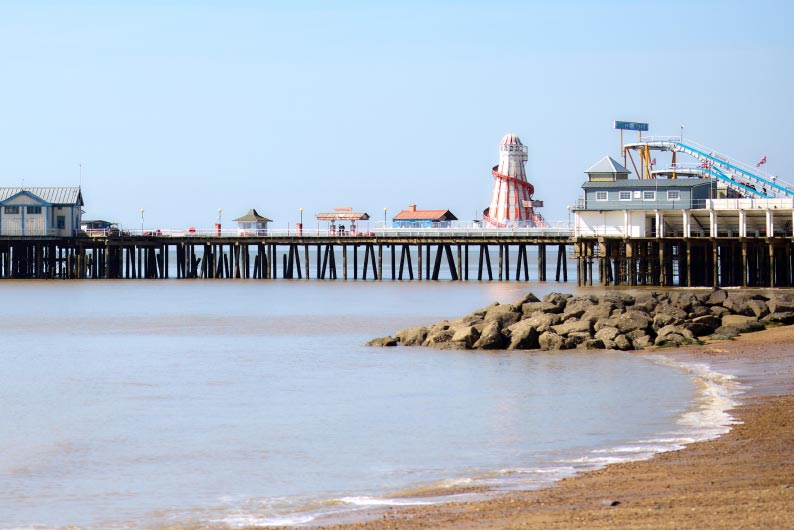 Fairground rides on Clacton Pier on the Essex coast