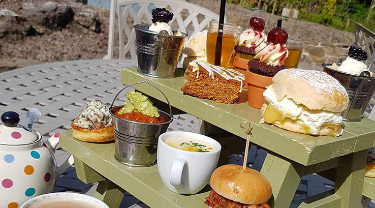 Tea and cakes on outside table