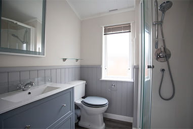 An en suite bathroom in a hot tub lodge at Parkdean Resorts
