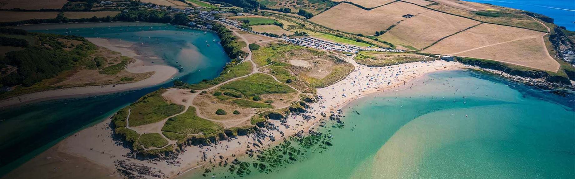 An aerial view over the coastline of Bigbury-on-Sea