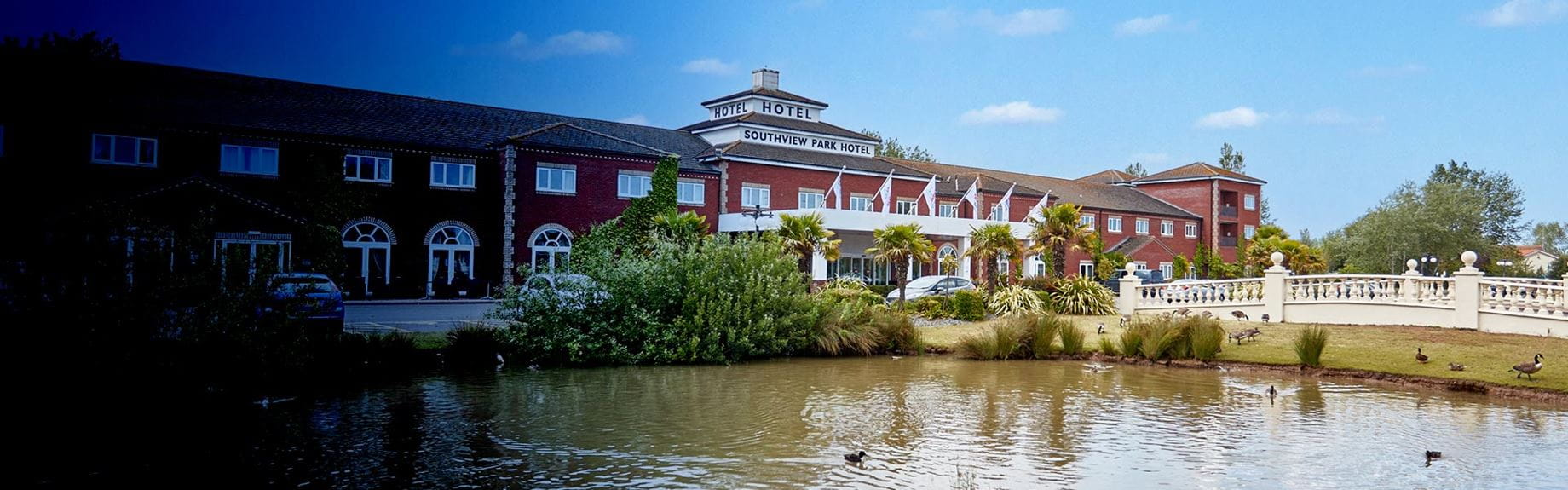 Hotel with bridge and lake