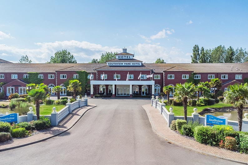 Hotel with bridge and lake
