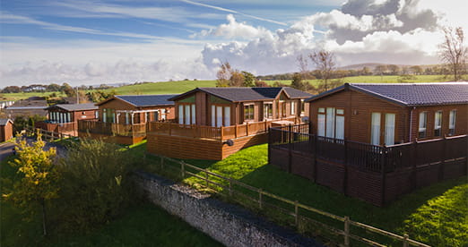 Lodges overlooking the countryside at Todber Valley Holiday Park in Lancashire