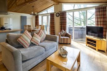 Interior shot of a lodge living room at Parkdean Resorts