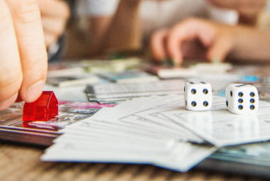 people playing a board game