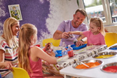 family making sand art