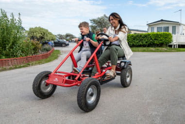 family on a double kart