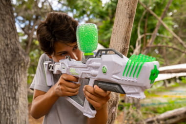 boy with a toy gel blaster