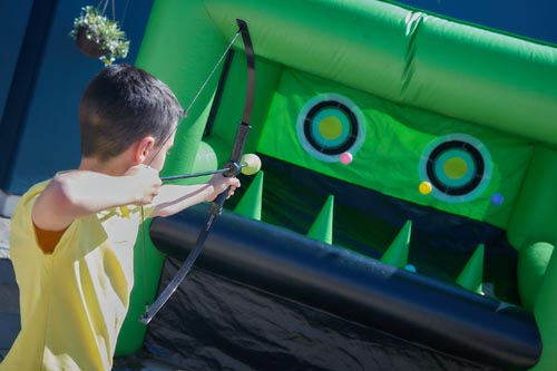 Boy playing archery