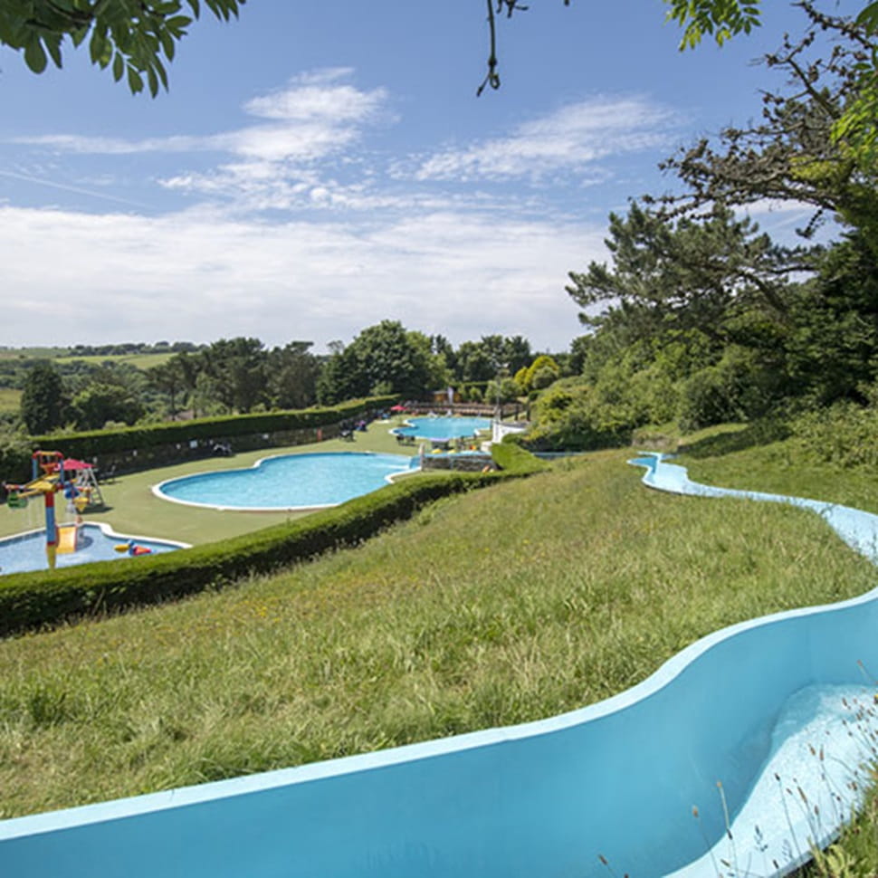 Waterslide and outdoor pool at Newquay Holiday Park