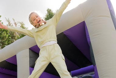 Girl bouncing on bounce park