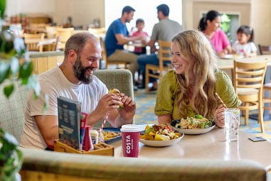 Couple eating food in restaurant