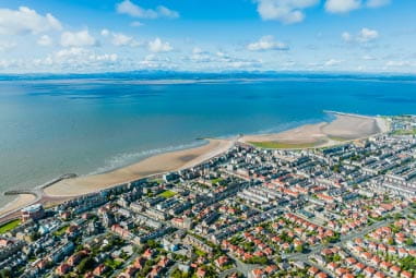 caravan park overlooking beautiful blue waters and sandy beach