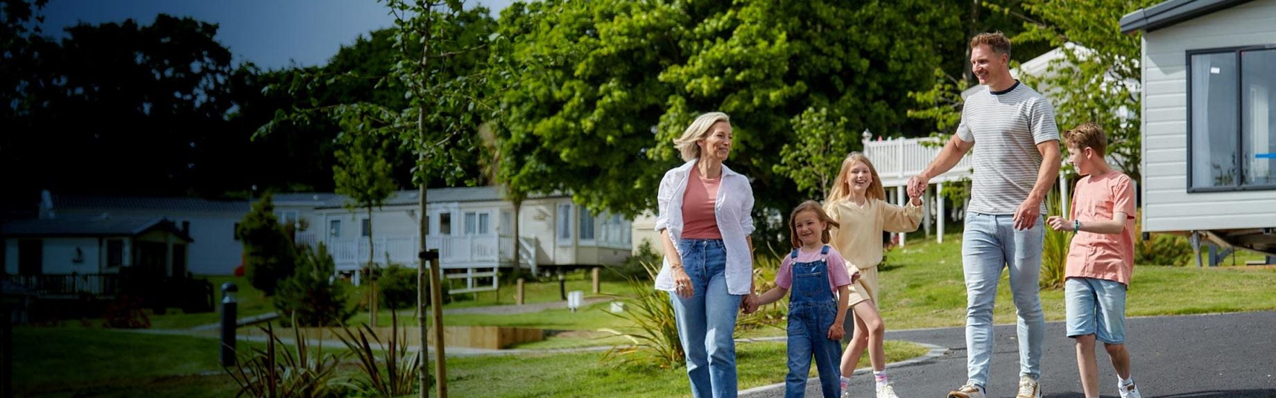 Family next to caravans