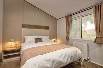master bedroom in Willerby Boston with king-size bed