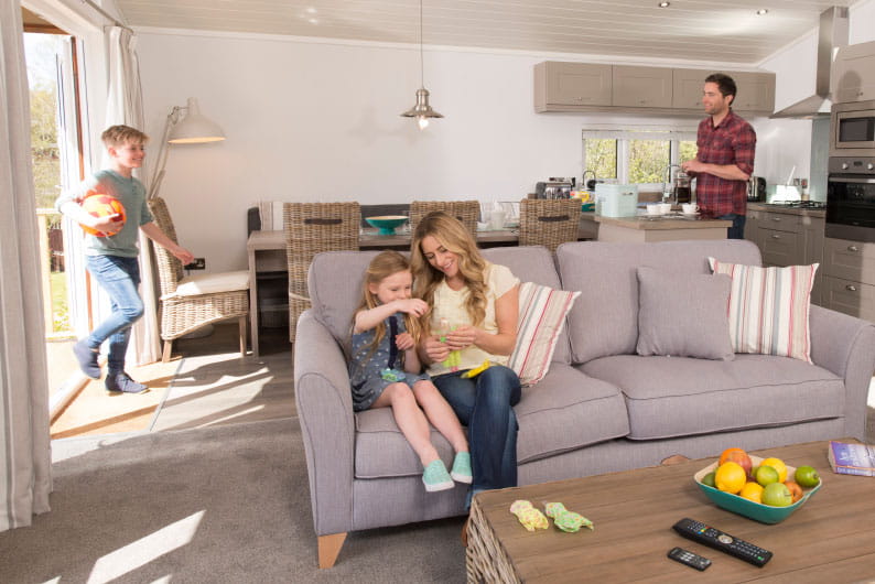 Family sat inside a lodge