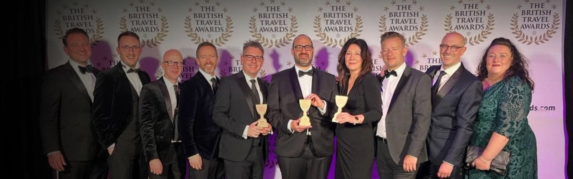 Employees of Parkdean smiling at an awards ceremony
