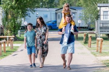 Family walking through parkdean resorts