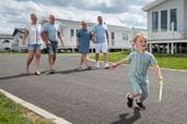 Family walking through parkdean resorts