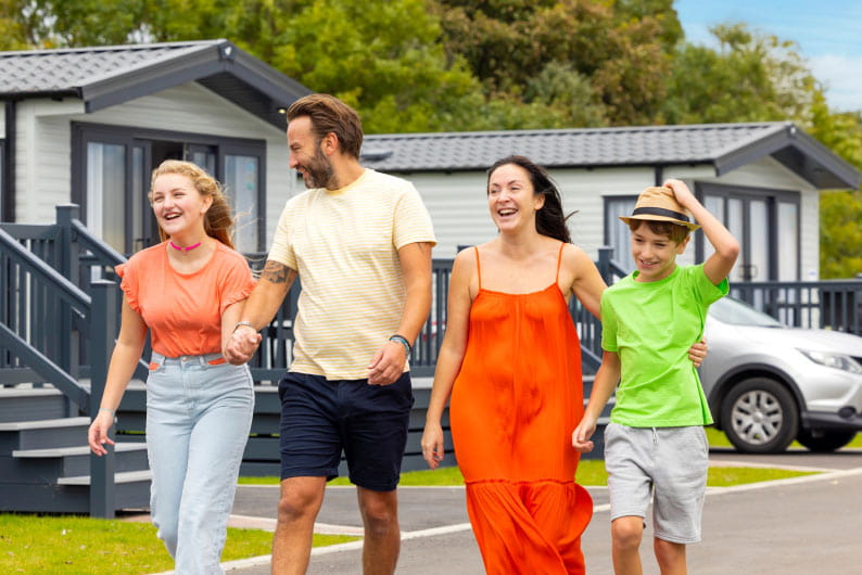 Family walking through parkdean resorts