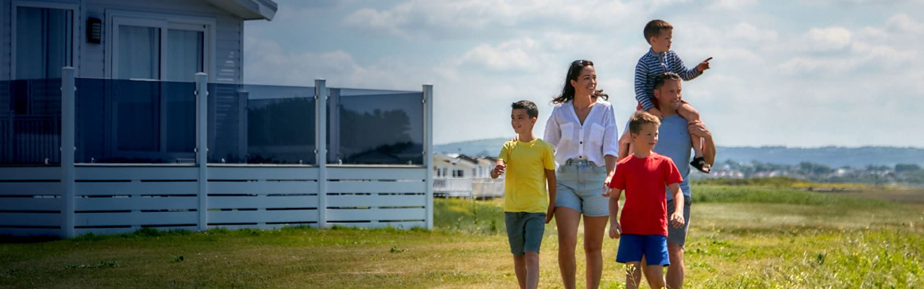 Family walking through parkdean resorts