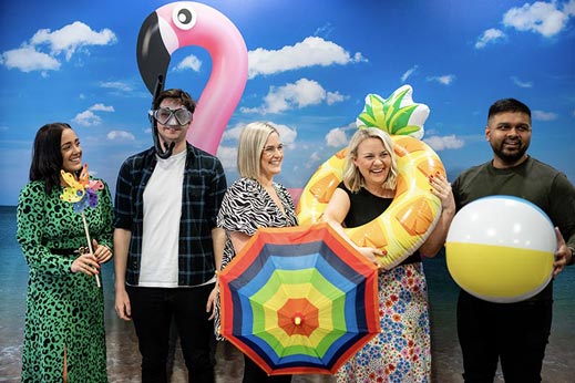 Parkdean Resorts employees posing with pool inflatables