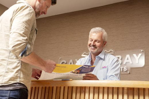 Older employee on reception