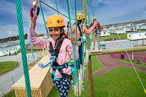Children on high ropes course at Holiday Park