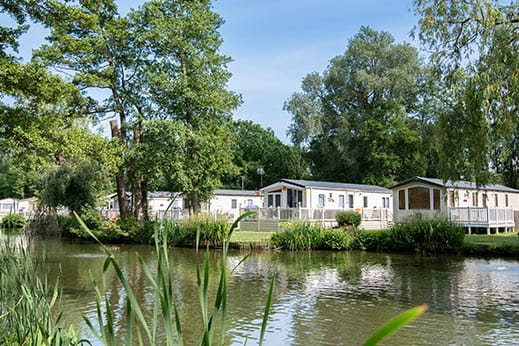 Caravans by a lake