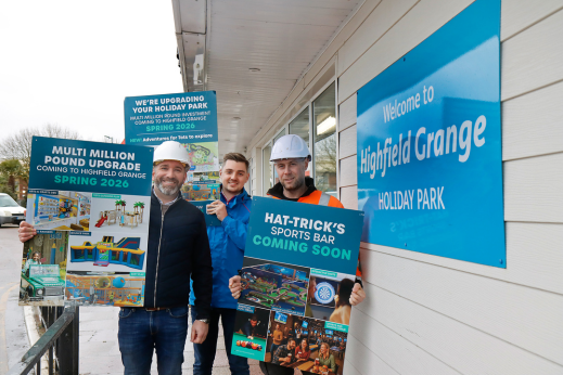 Men in construction hats at a holiday park