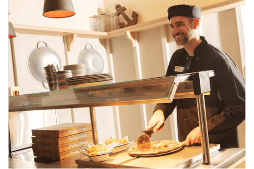 Chef working in holiday park kitchen