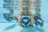 Family playing under water