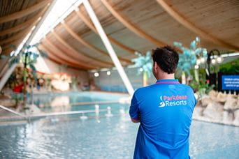 Holiday park team member at swimming pool