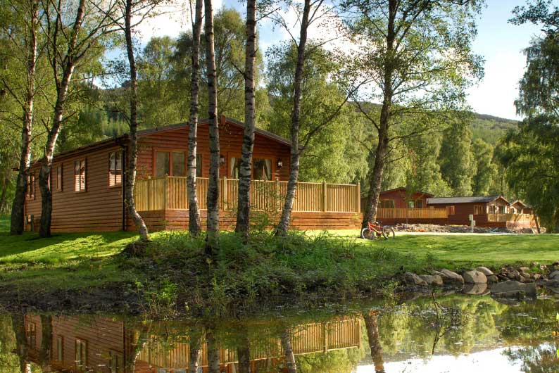 Wooden lodge beside a lake