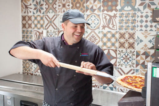 Chef making pizza