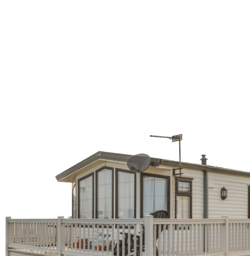 Outside of a caravan with a veranda 