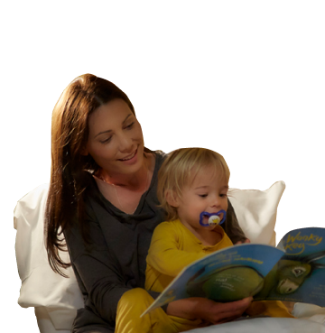 mother and baby reading bed time story