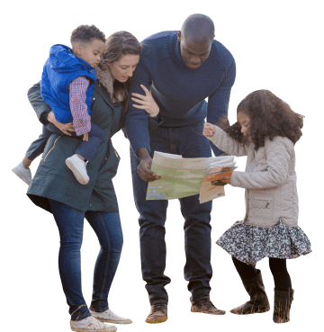 Family of four looking at a map at Parkdean Resorts