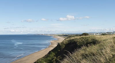 Caravans overlooking the beach at Crimdon Dene Holiday Park