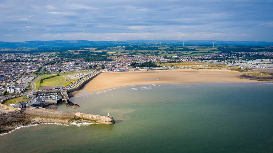 An aerial view over Porthcawl harbour and bay