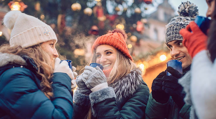 Friends enjoying some mulled wine together