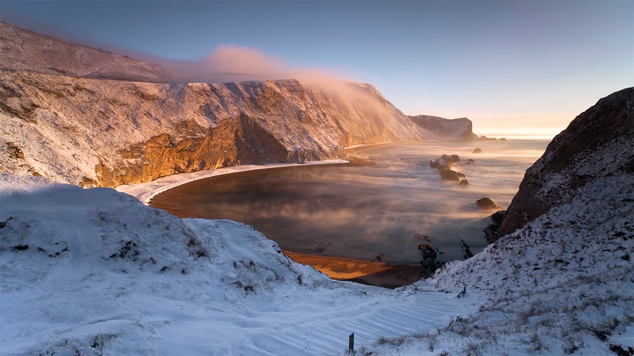 A frosty morning at St Oswalds Bay on the Dorset Coast in winter