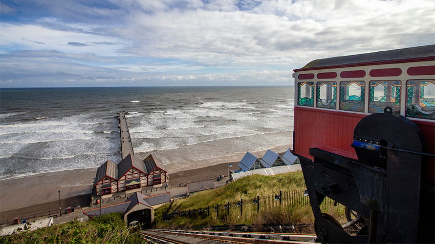 A view over Saltburn by the Sea's pier and seafront
