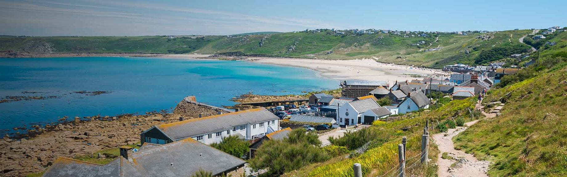 A view over a beach town on the South West Coast Path in Cornwall