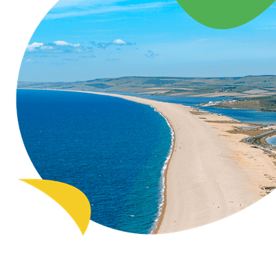 An aerial view over Chesil Beach stretching out for miles along the Dorset Coast