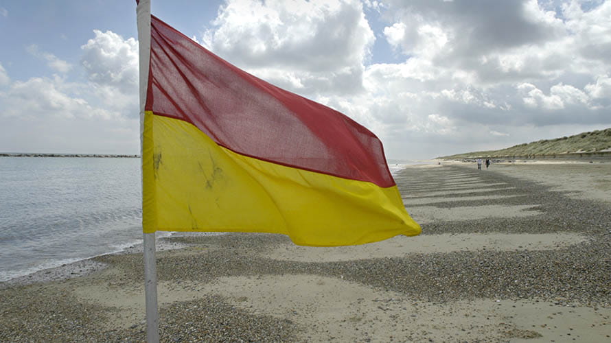 A lifeguard flag at Sea Palling Beach in Norfolk