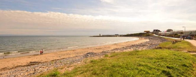 A sandy beach on a sunny day